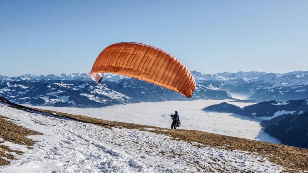 paraglider, flying, paragliding, freedom, leisure time, activity, sea of fog, snow, flight, preparation, flight weather, mountain landscape, nature, winter, panoramic views